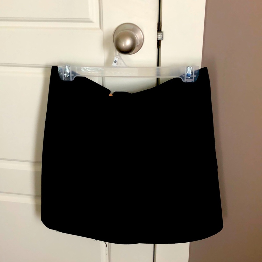 Kendal and Kylie medium, black skirt.